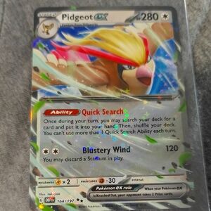 Pidgeot EX Pokémon Card with Holographic Design